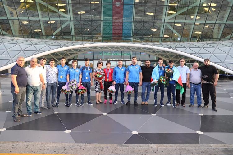 Riqada uğura imza atan cüdoçularımız Bakıya döndü - FOTOSESSİYA