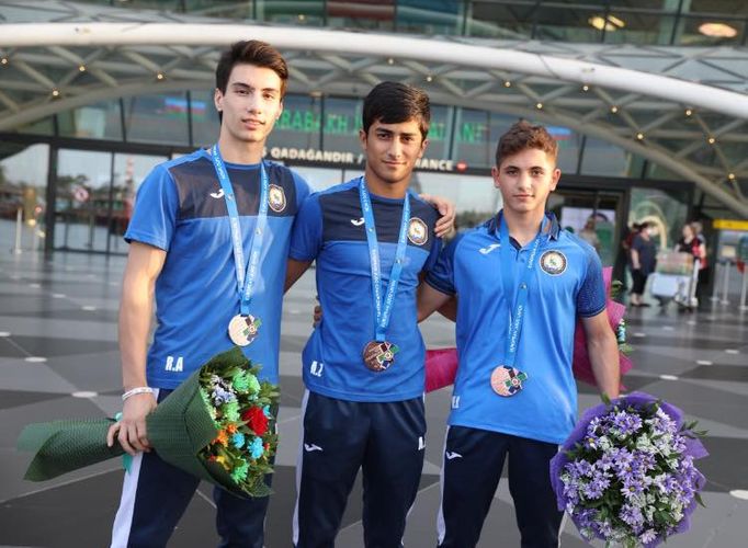 Riqada uğura imza atan cüdoçularımız Bakıya döndü - FOTOSESSİYA