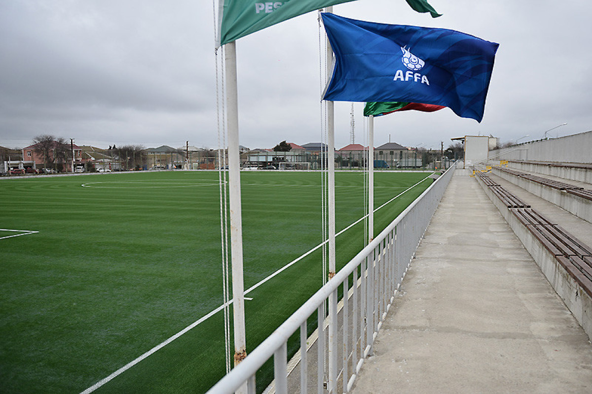 Binə stadionunun ot örtüyü yenilənib - FOTO 