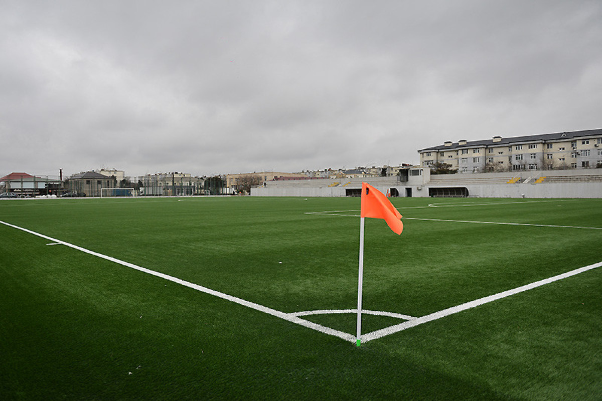 Binə stadionunun ot örtüyü yenilənib - FOTO 