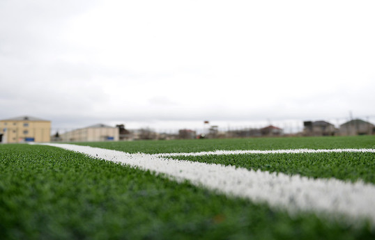 Binə stadionunun ot örtüyü yenilənib - FOTO 